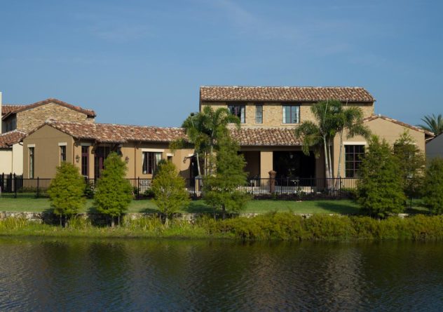 issa homes casadilusso kimball trace house exterior on a lake