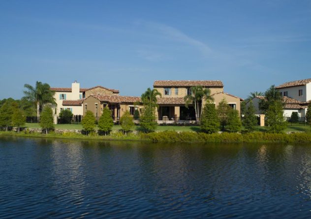 issa homes casadilusso kimball trace house exterior next to a lake